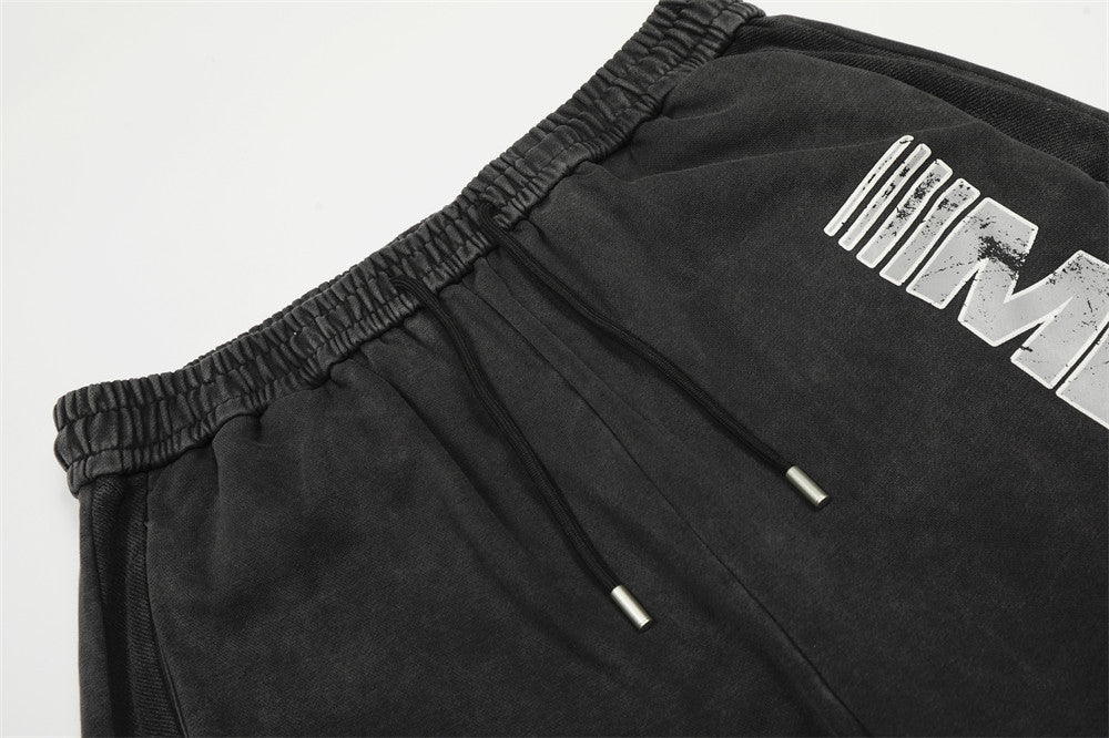 Dikey Yazı Baskılı Yıkamalı Bol Paça Pantolon