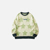 Front view of the green Y2K Stellar Knit Sweater in a gray background