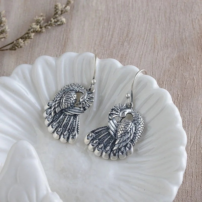 El Yapımı Vintage Metal Tavus Kuşu Sallantılı Küpe
